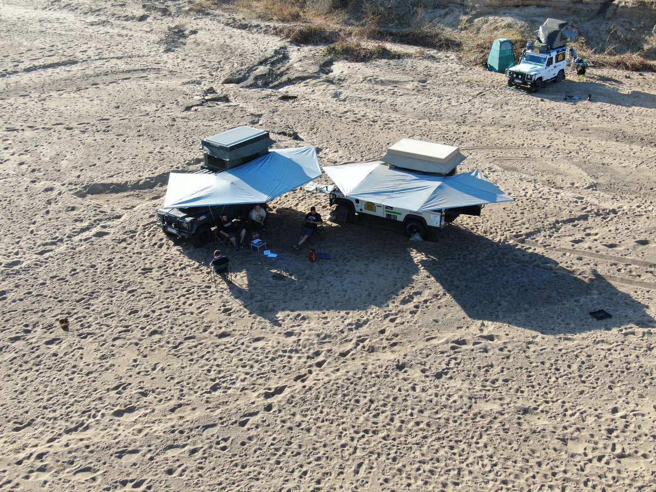 bunduawn wing awning setup on 2 SUV