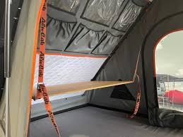 alu-cab roof tent accessory pic of a drop down roof tent tent table