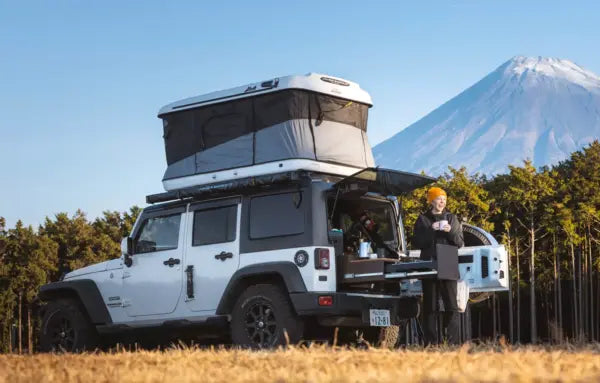 james baroud rooftent on a white 4x4 