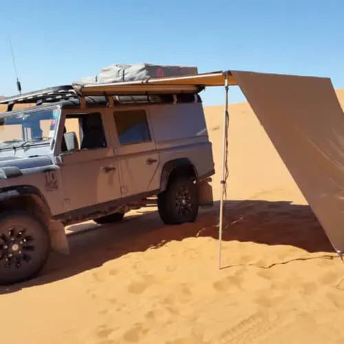 tufftrek side awning end wall picture in the desert on a land rover defender 110