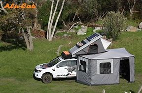 alu-cab shadow awning side walls setup on white SUV