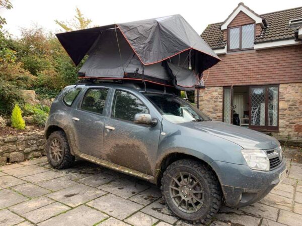 tuff-trek ultra-lite roof top tentbox on Dacia Duster car